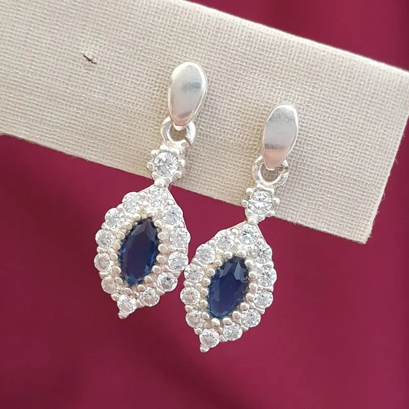 Brinco Pedra Azul Borda Cravejada