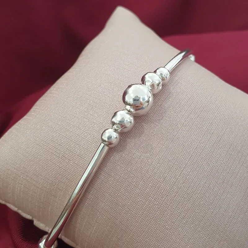 Pulseira Bolas e Tubos