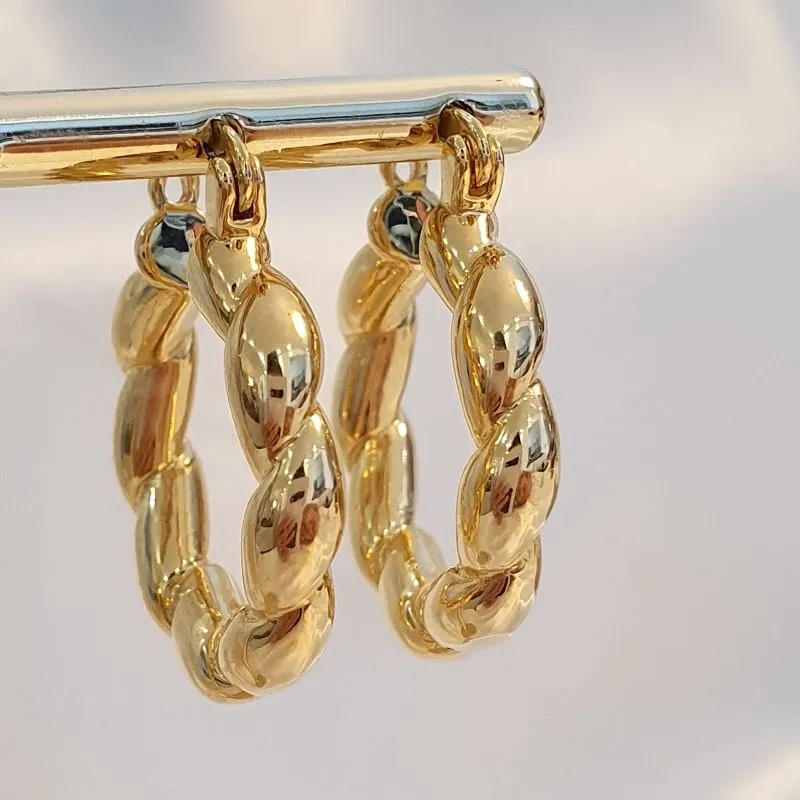 Brinco Argola Tubo Torcido