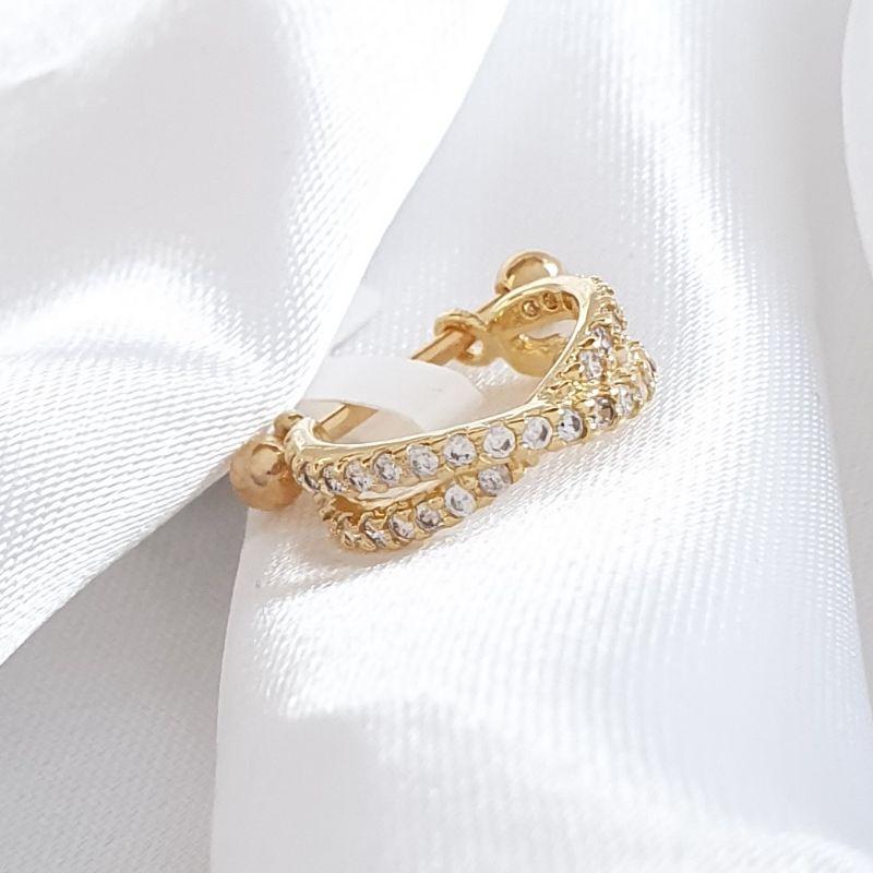 Piercing Conch em X Cravejado